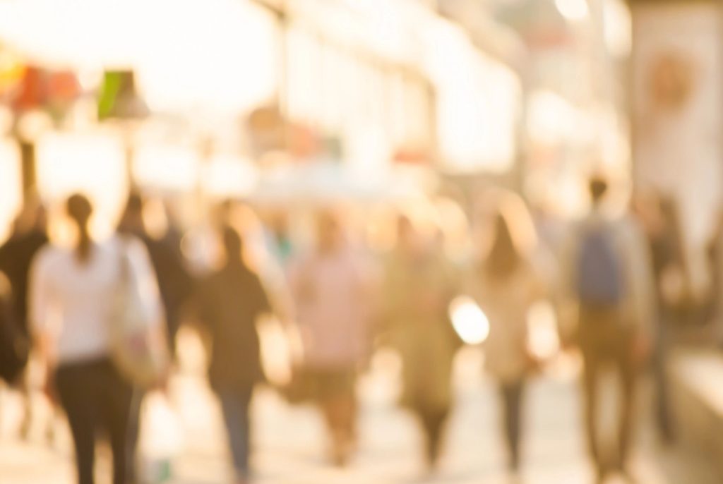 Image of people walking on a city street